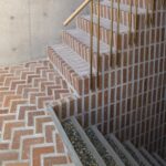 Brick and terrazzo stair detail of AOI Celestie Coffee Roastery