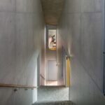 Concrete stairwell of AOI Celestie Coffee Roastery