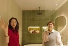 천만 원 월세살이를 접고 손수 지은 집, 손담비의 새 보금자리 손담비가 올리브 그린 타일 욕실에서 인테리어를 소개하는 모습