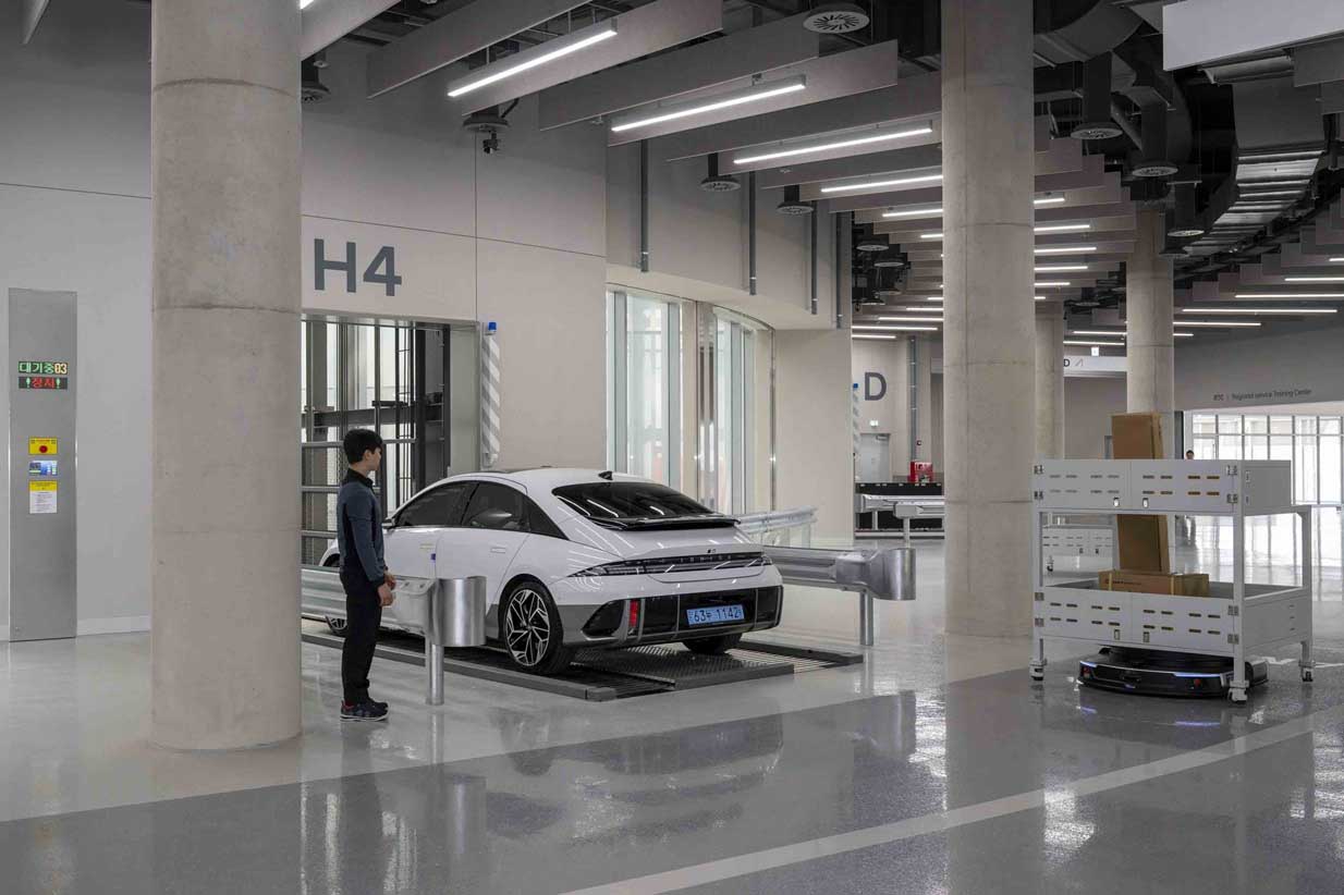 Suwon High-Tech Center service bay with car lift